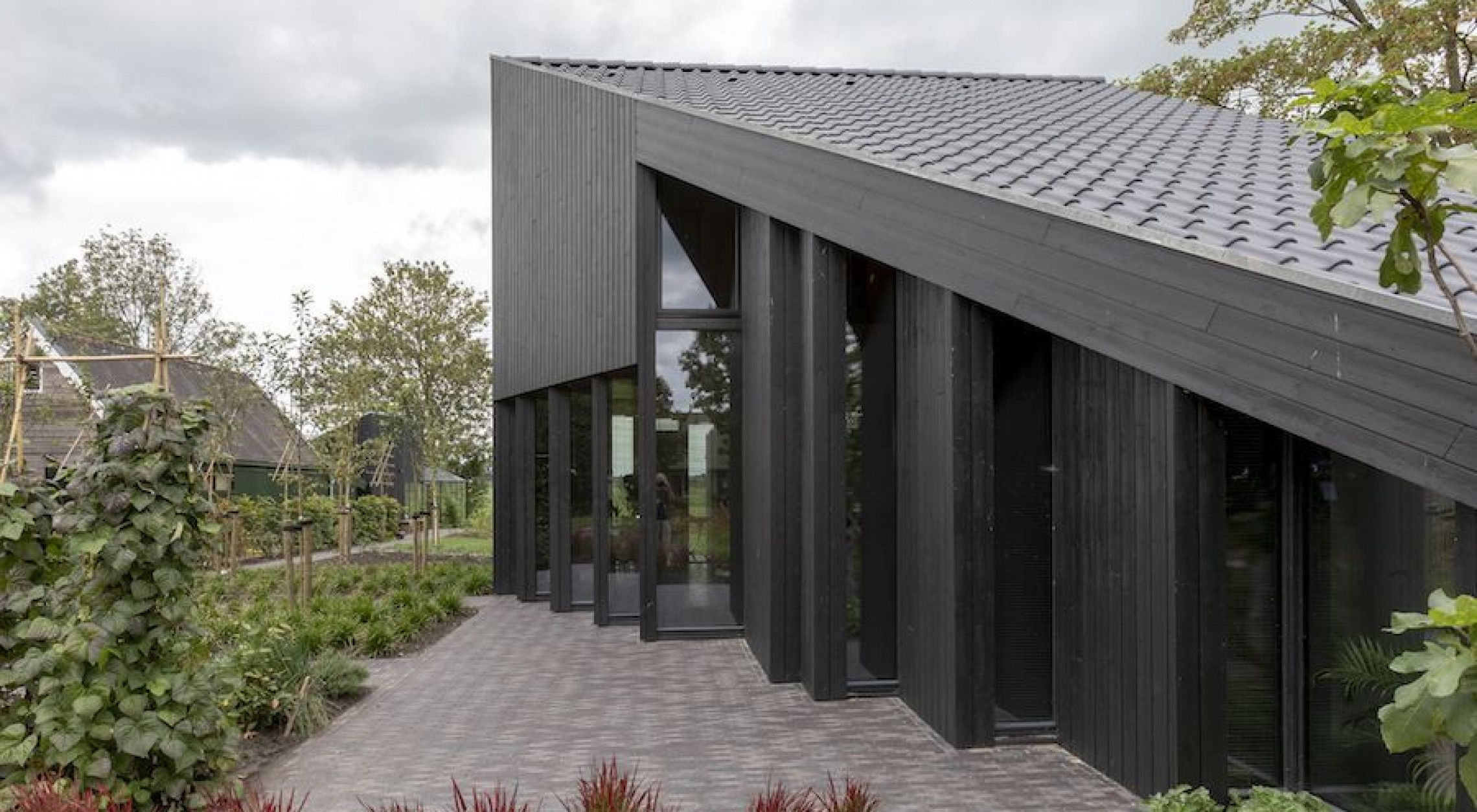 Erkerhuis met schoepenwand