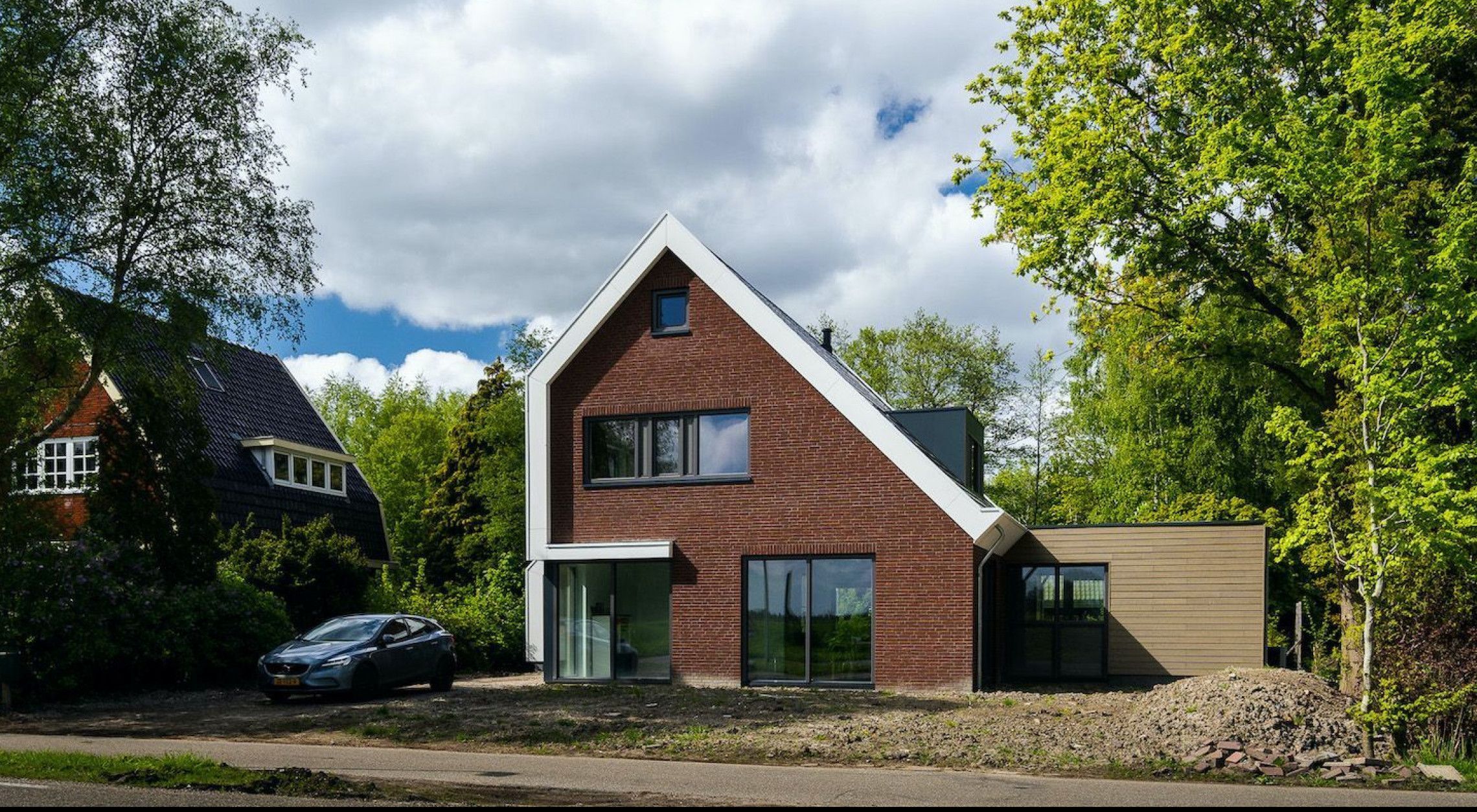 Vrijstaande woning met houten geveldelen