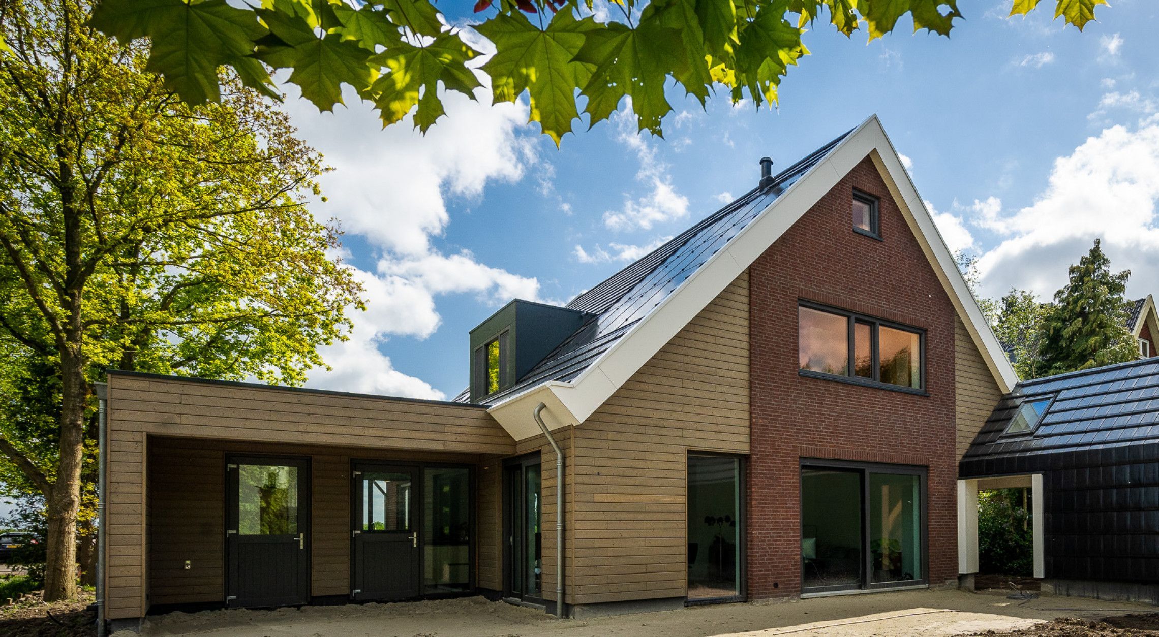 Vrijstaande woning met houten geveldelen